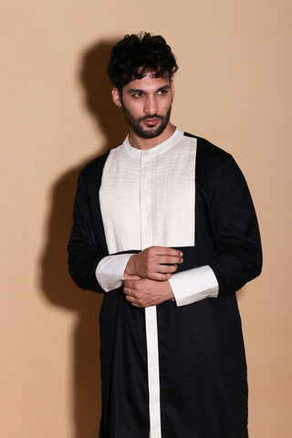 Black and Cream tuxedo pleated mid length kurta with narrow pants.