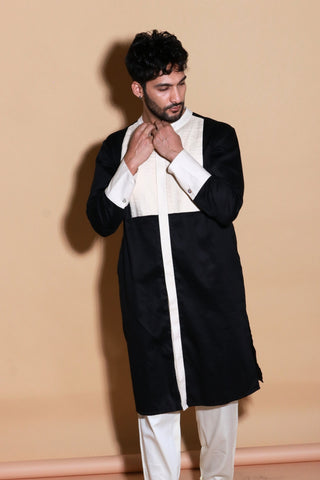 Black and Cream tuxedo pleated mid length kurta with narrow pants.