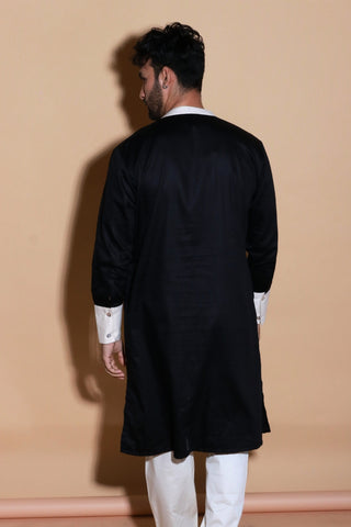 Black and Cream tuxedo pleated mid length kurta with narrow pants.