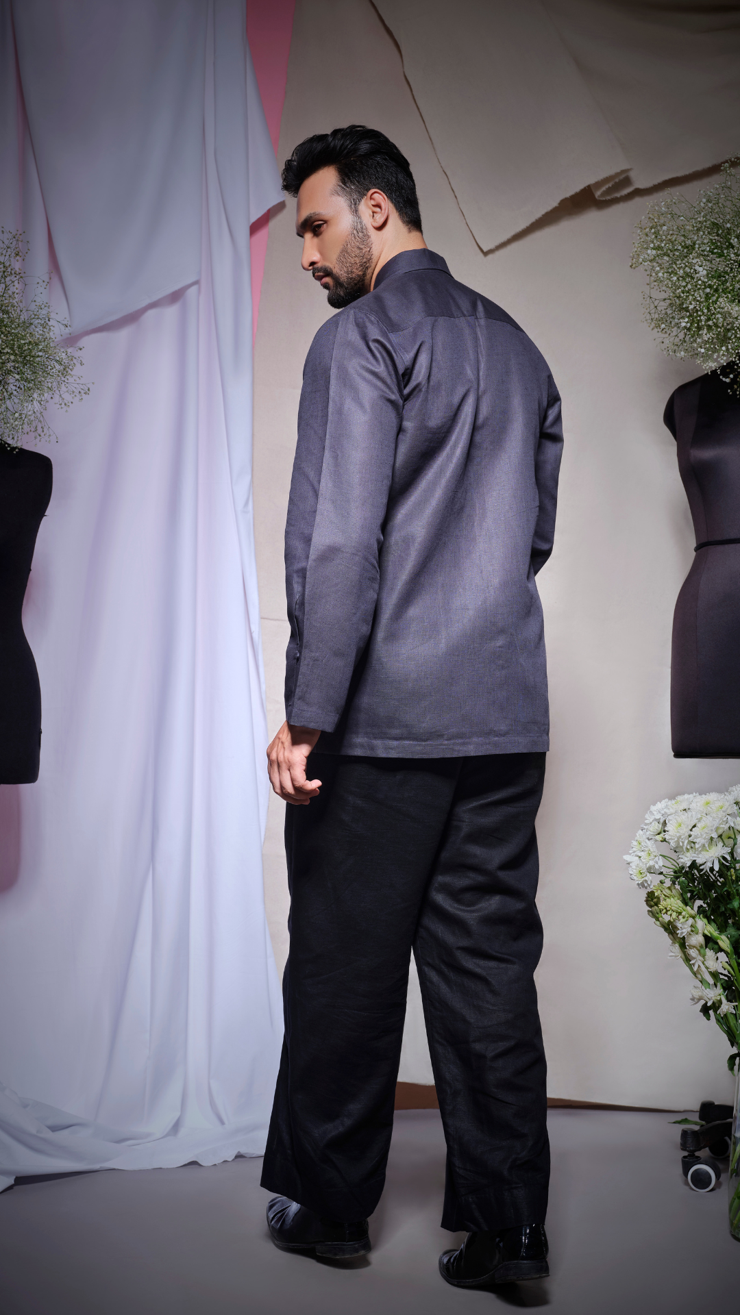 charcoal grey linen uneven cone shaped pleated yolk on both sides of the placket with sailor collar