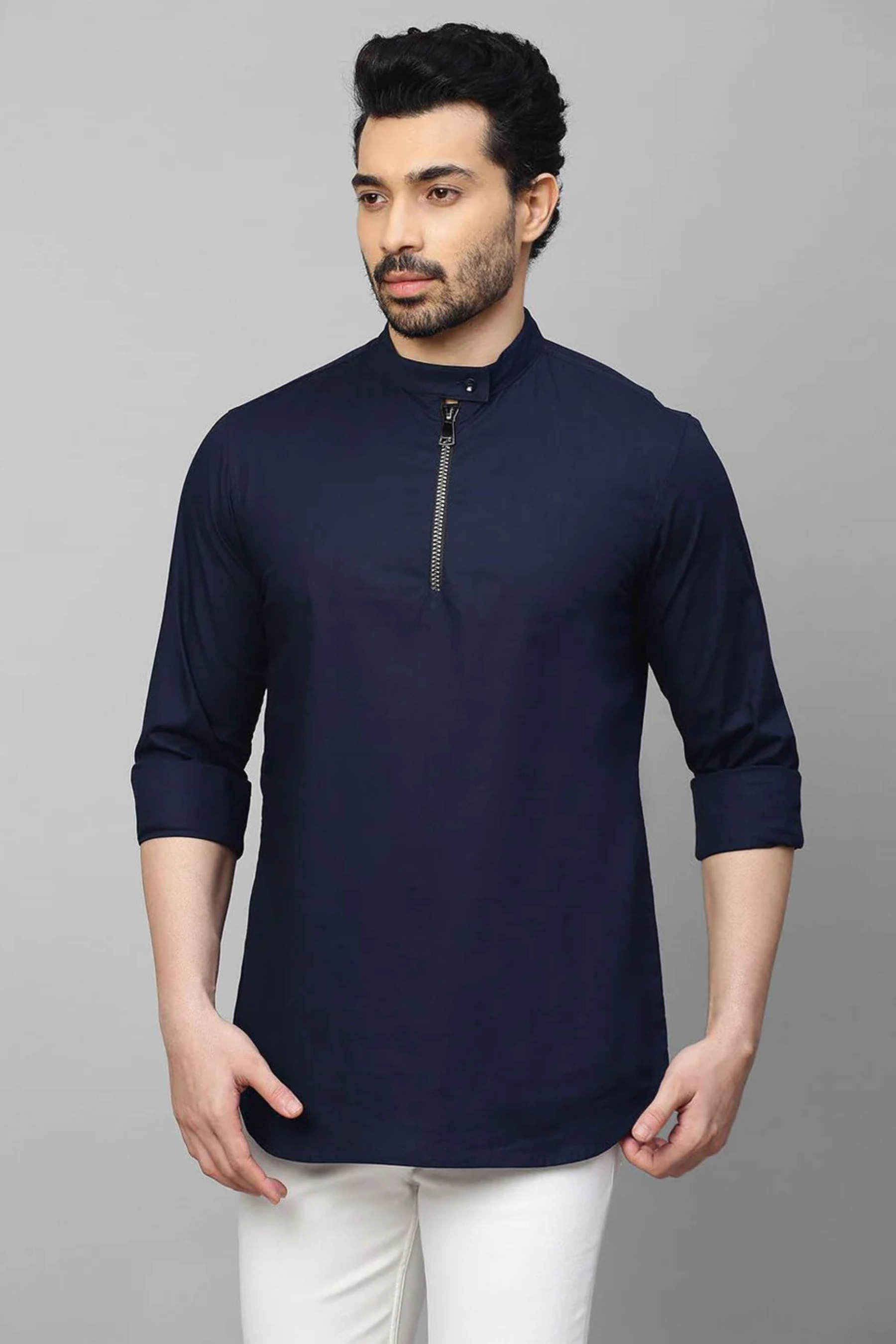 Blue mandarin collar shirt with half zipper detailing.