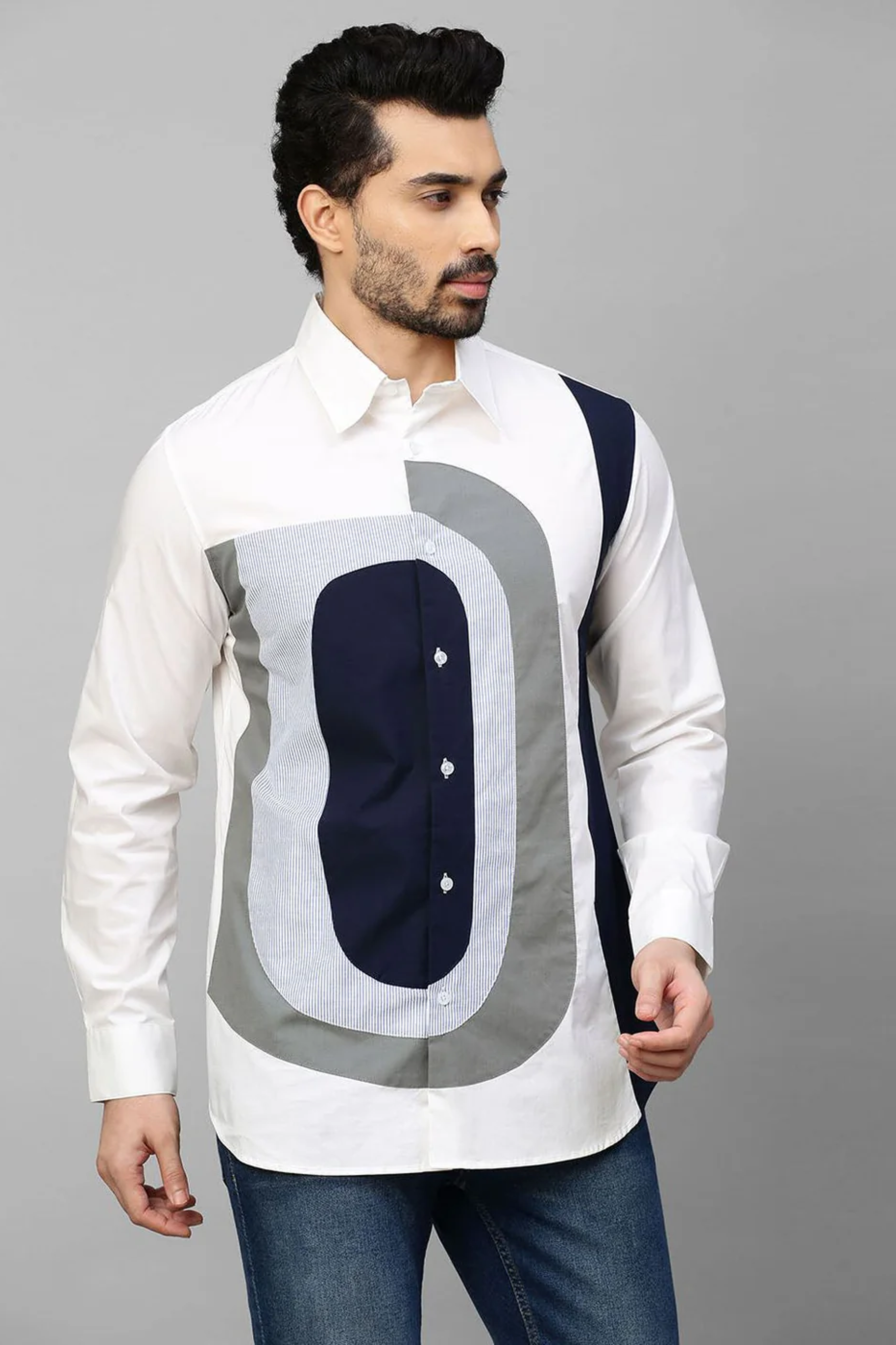 White shirt with color block patch detailing.