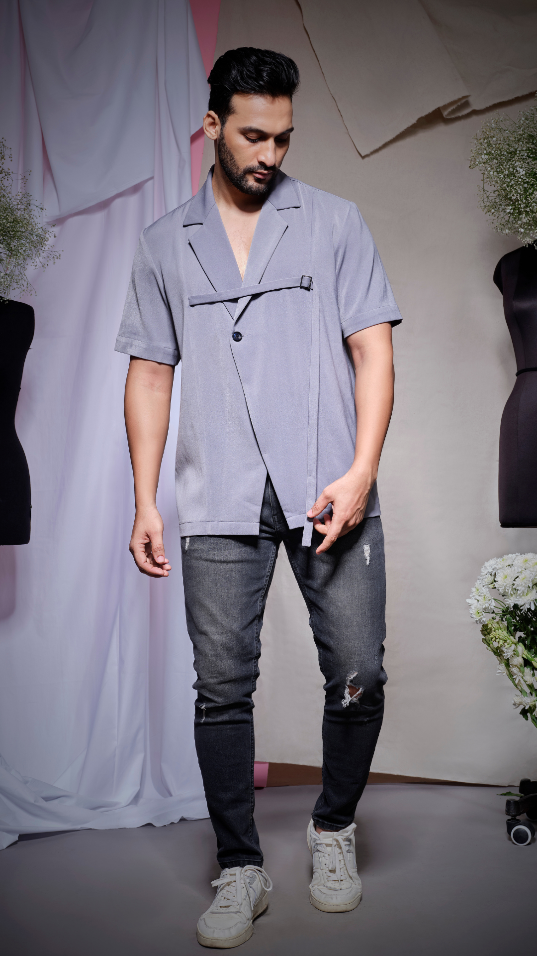 grey scuba half sleeve shirt with open collar, one button and buckle feature