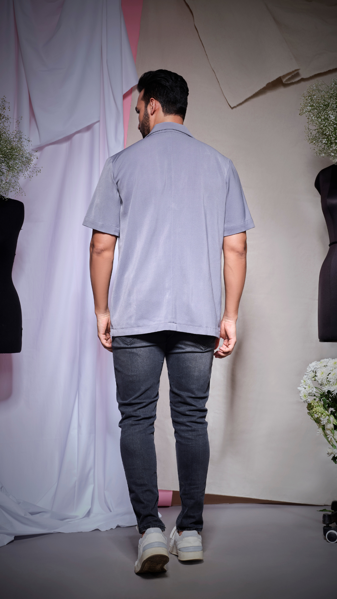 grey scuba half sleeve shirt with open collar, one button and buckle feature