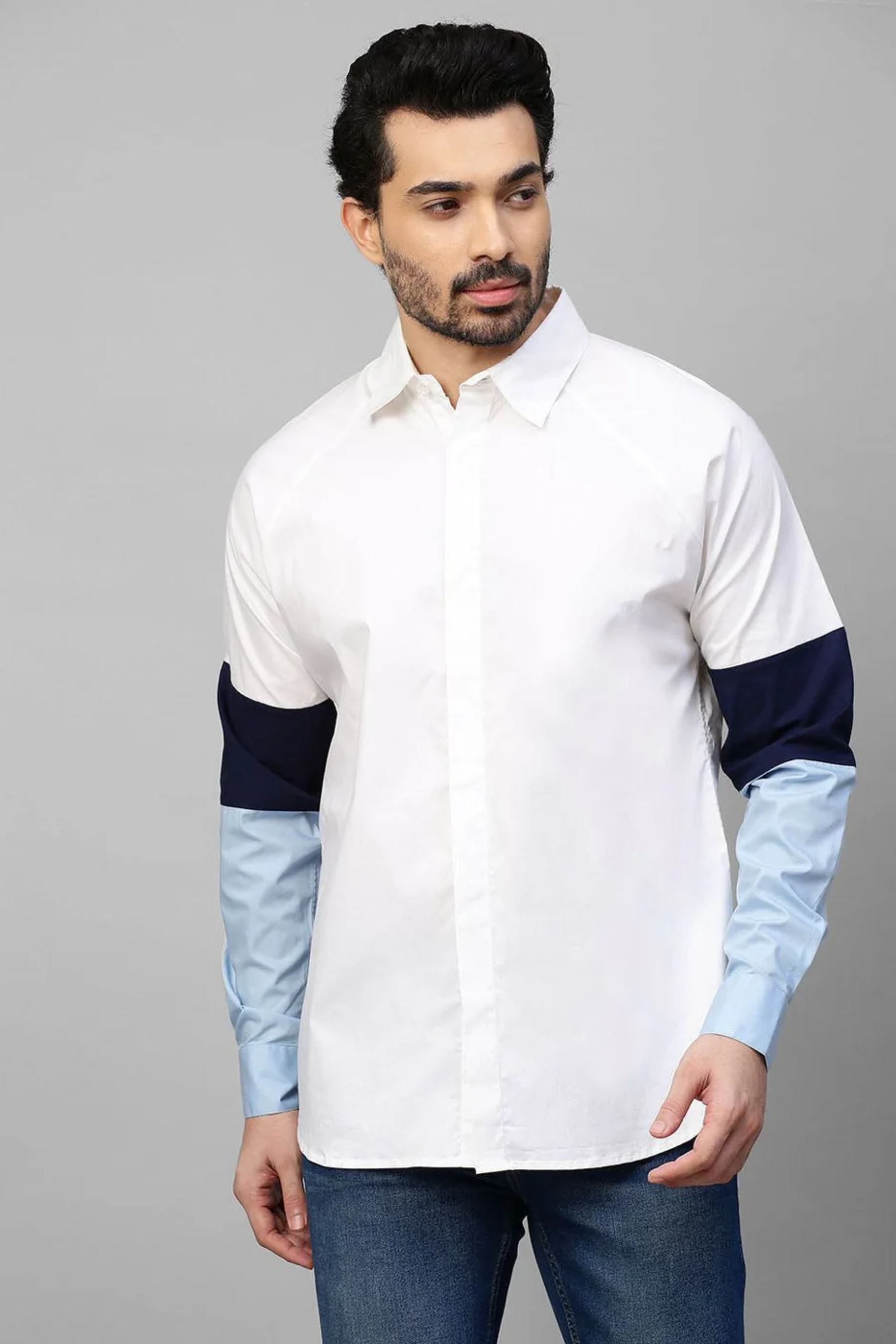 White shirt shades of blue band feature on sleeves.