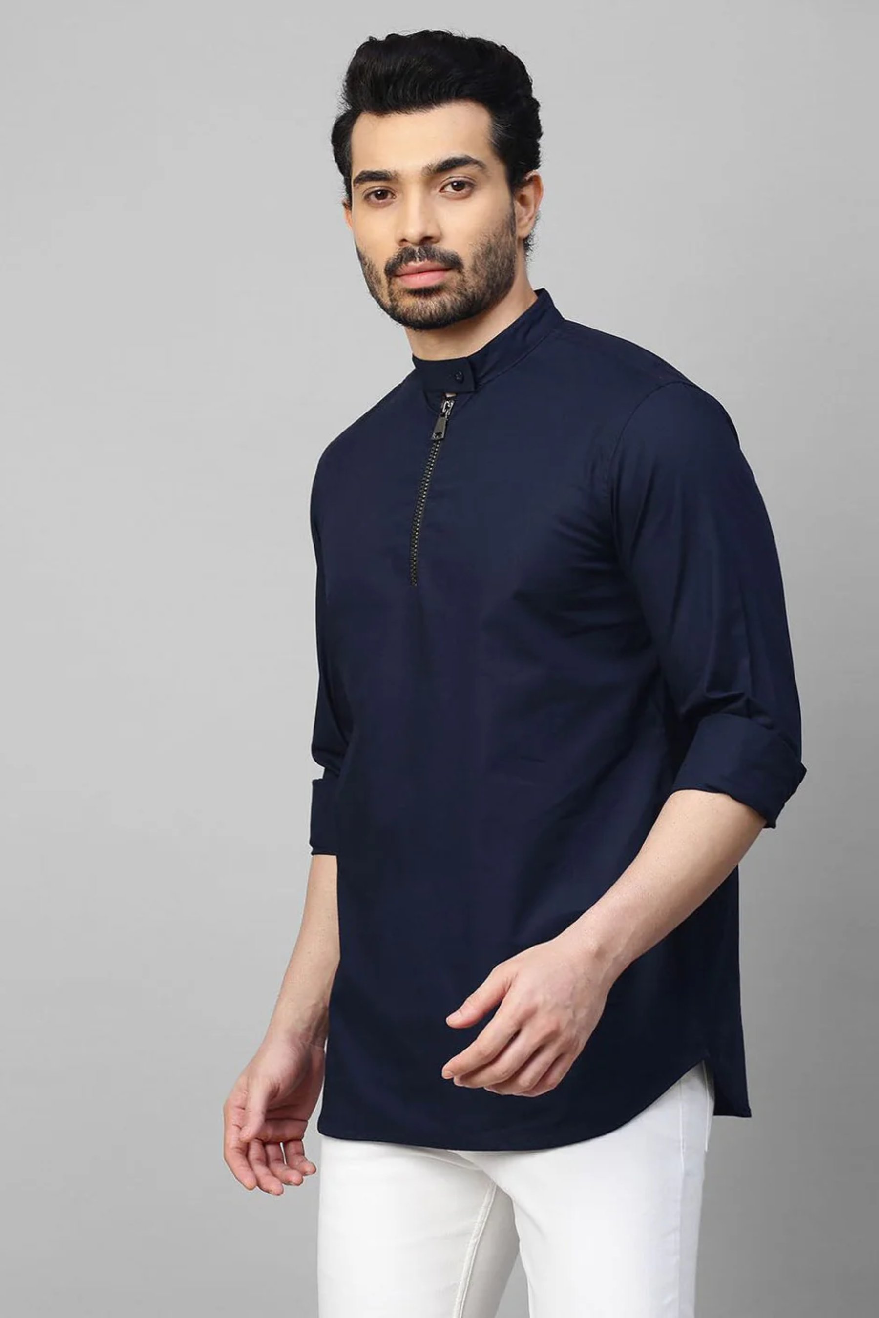Blue mandarin collar shirt with half zipper detailing.