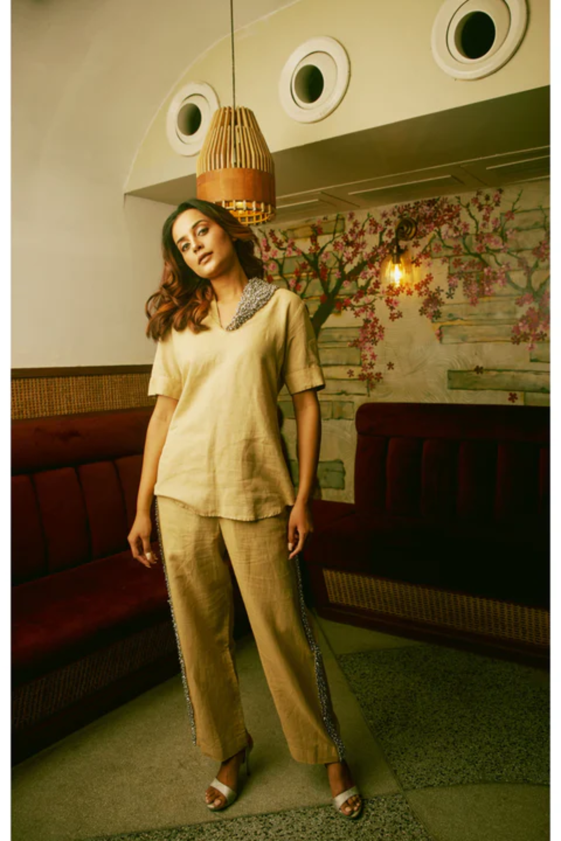 Beige linen co-ord set features with pearl & diamond work with matching straight pants.