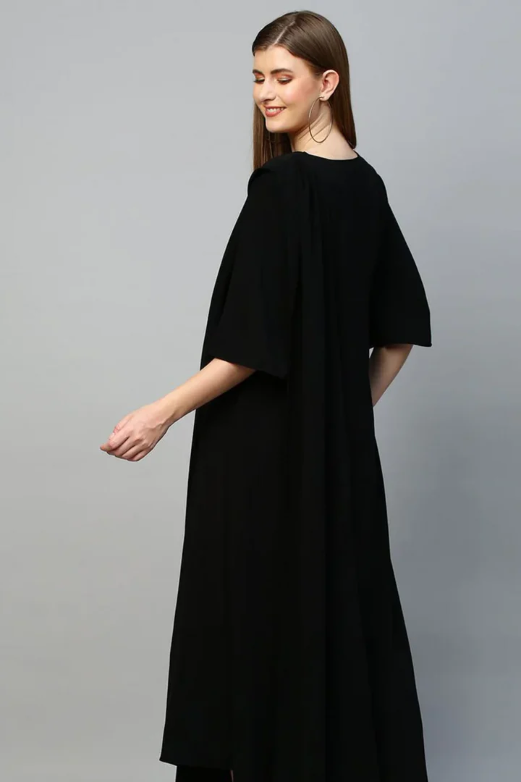 Black top with white pants cord set