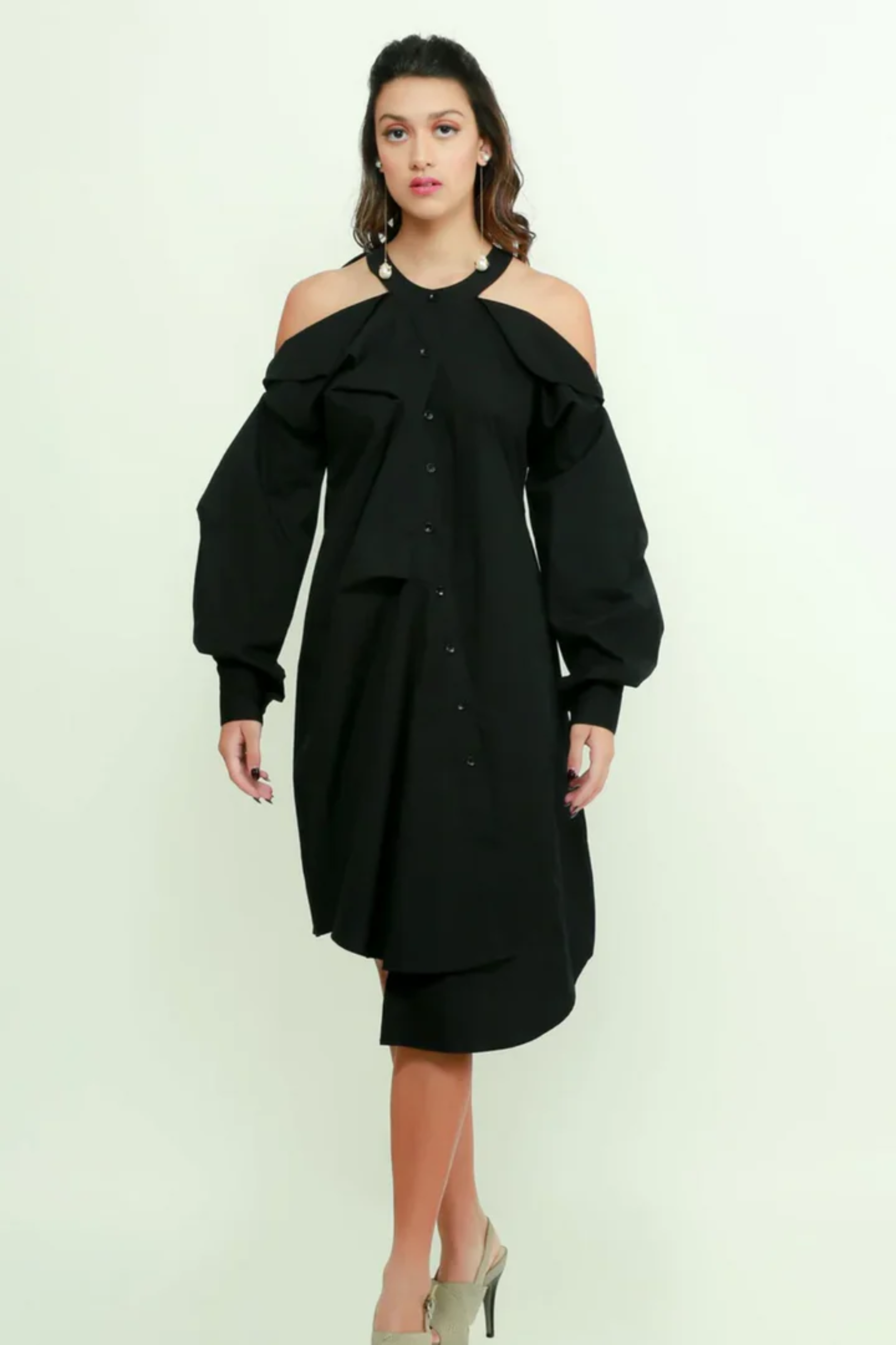 Black midi flap dress with pleated sleeves and an asymmetric placket detailing.