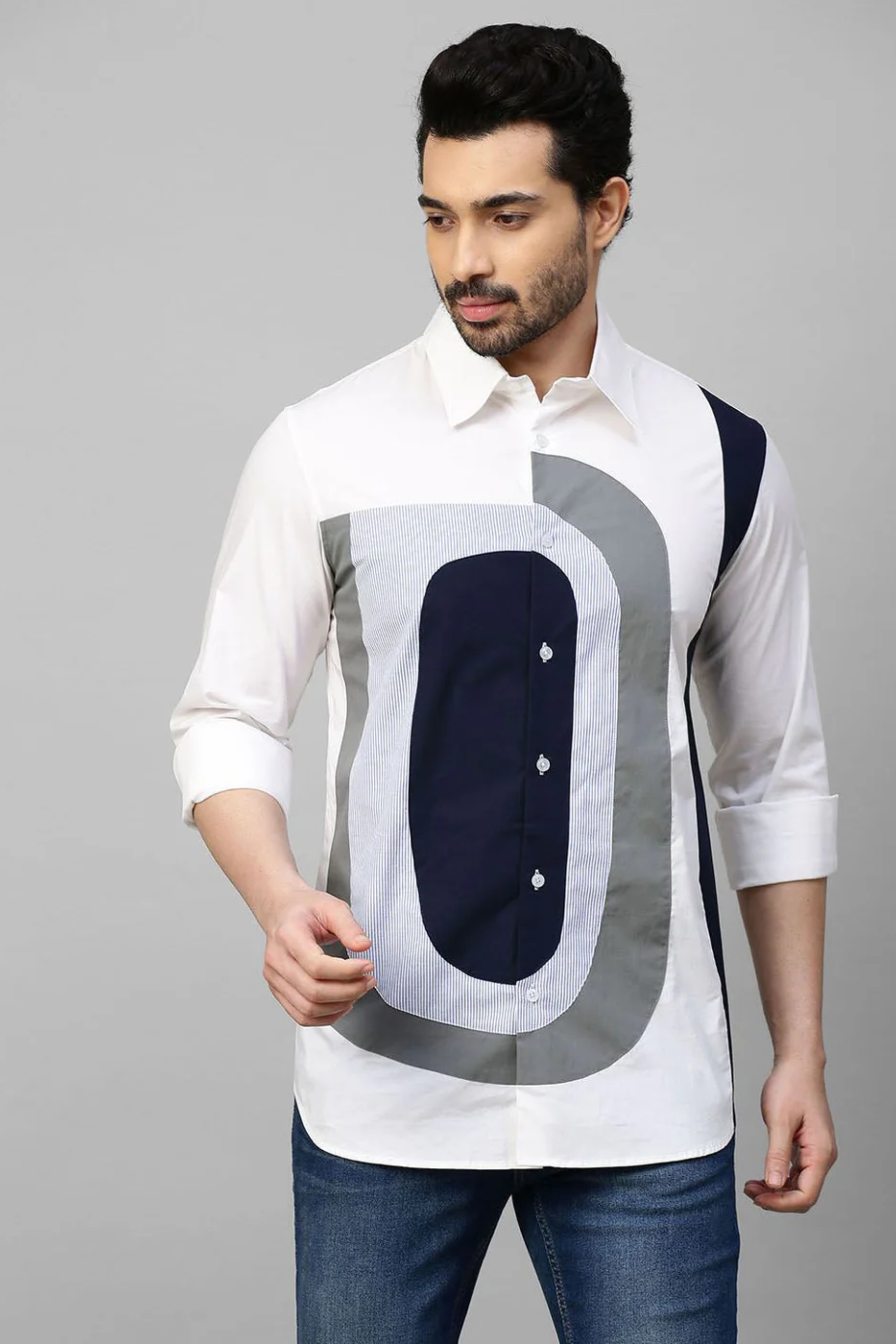 White shirt with color block patch detailing.