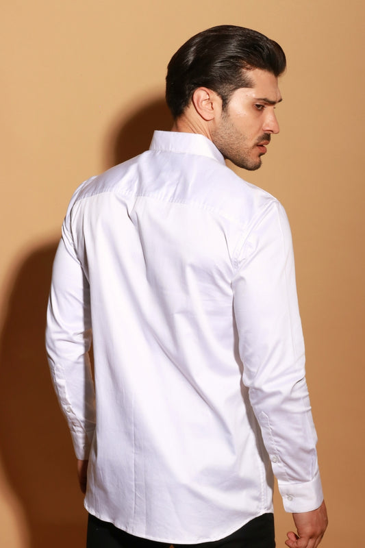 Classic white shirt with open bow design patch detailing.