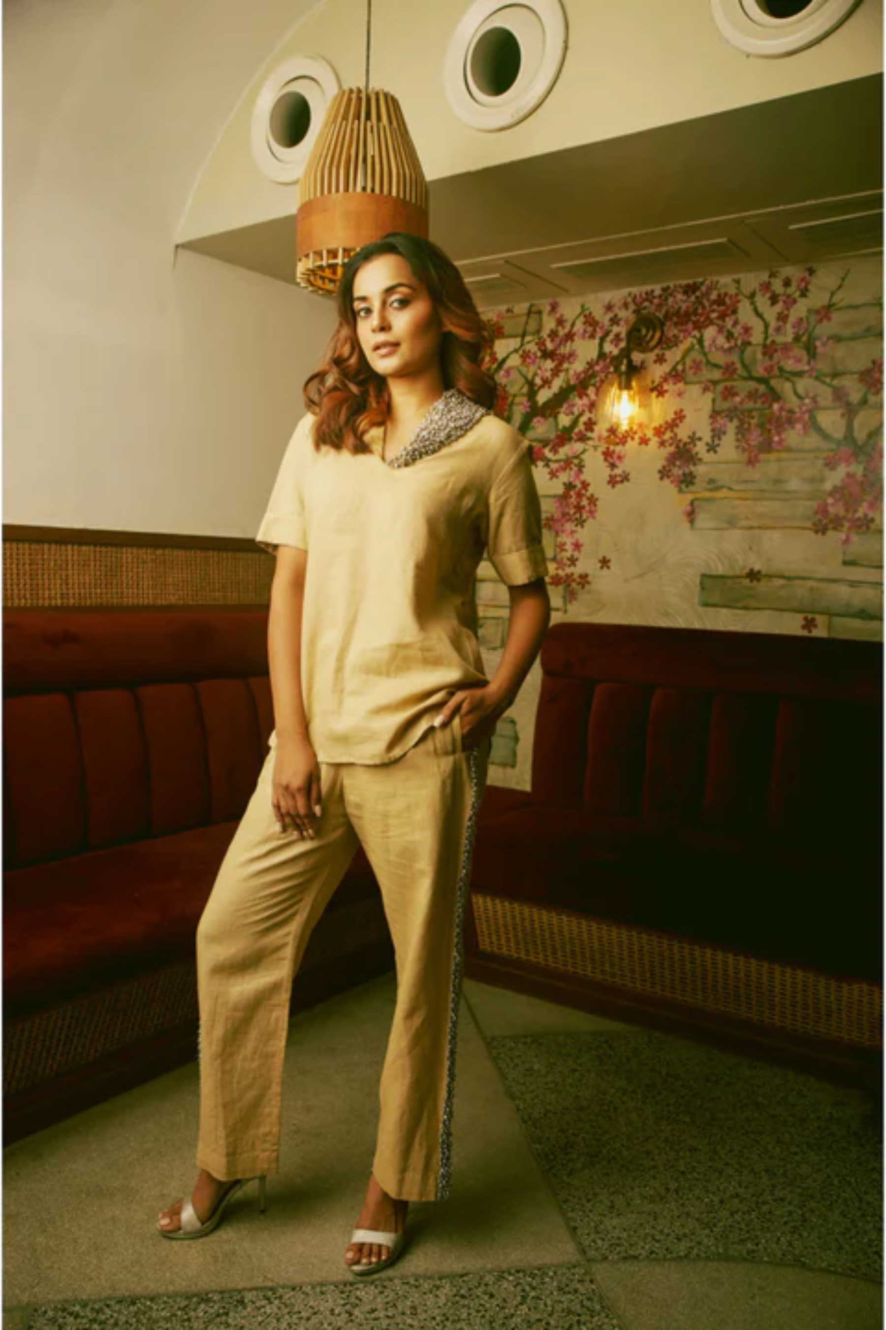 Beige linen co-ord set features with pearl & diamond work with matching straight pants.