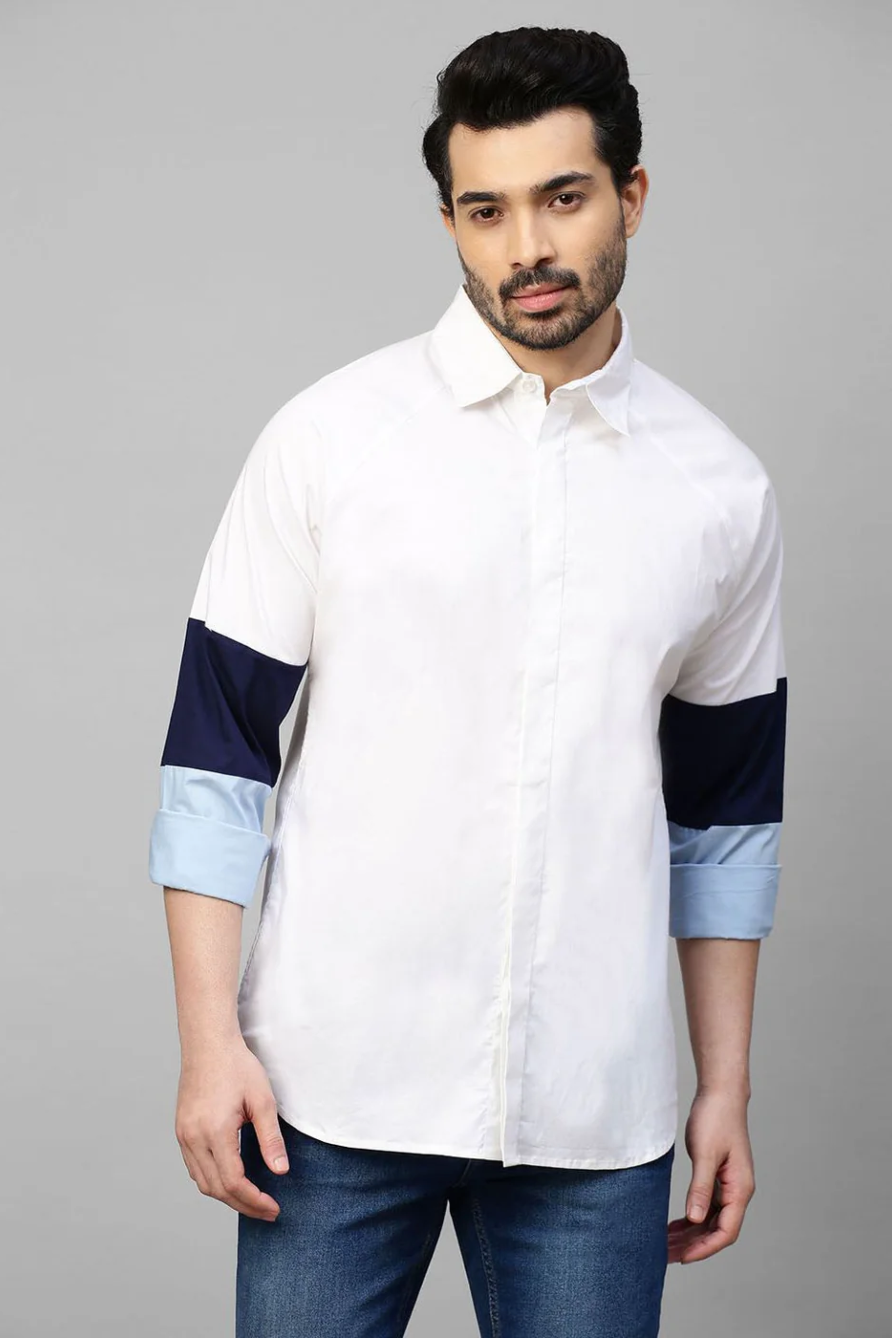 White shirt shades of blue band feature on sleeves.