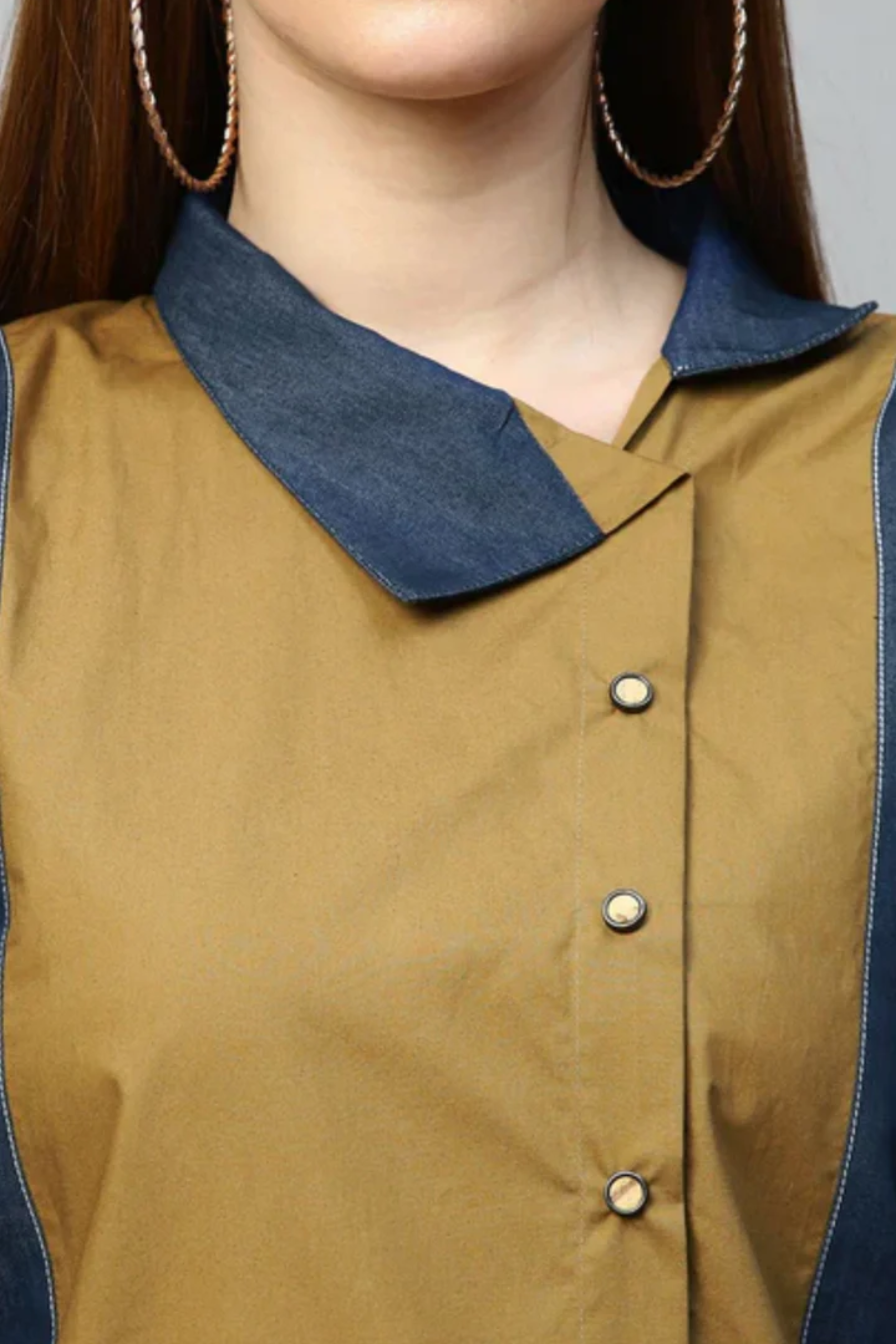 Blue and khaki short shirt dress features raglan sleeves and a chinese collar.
