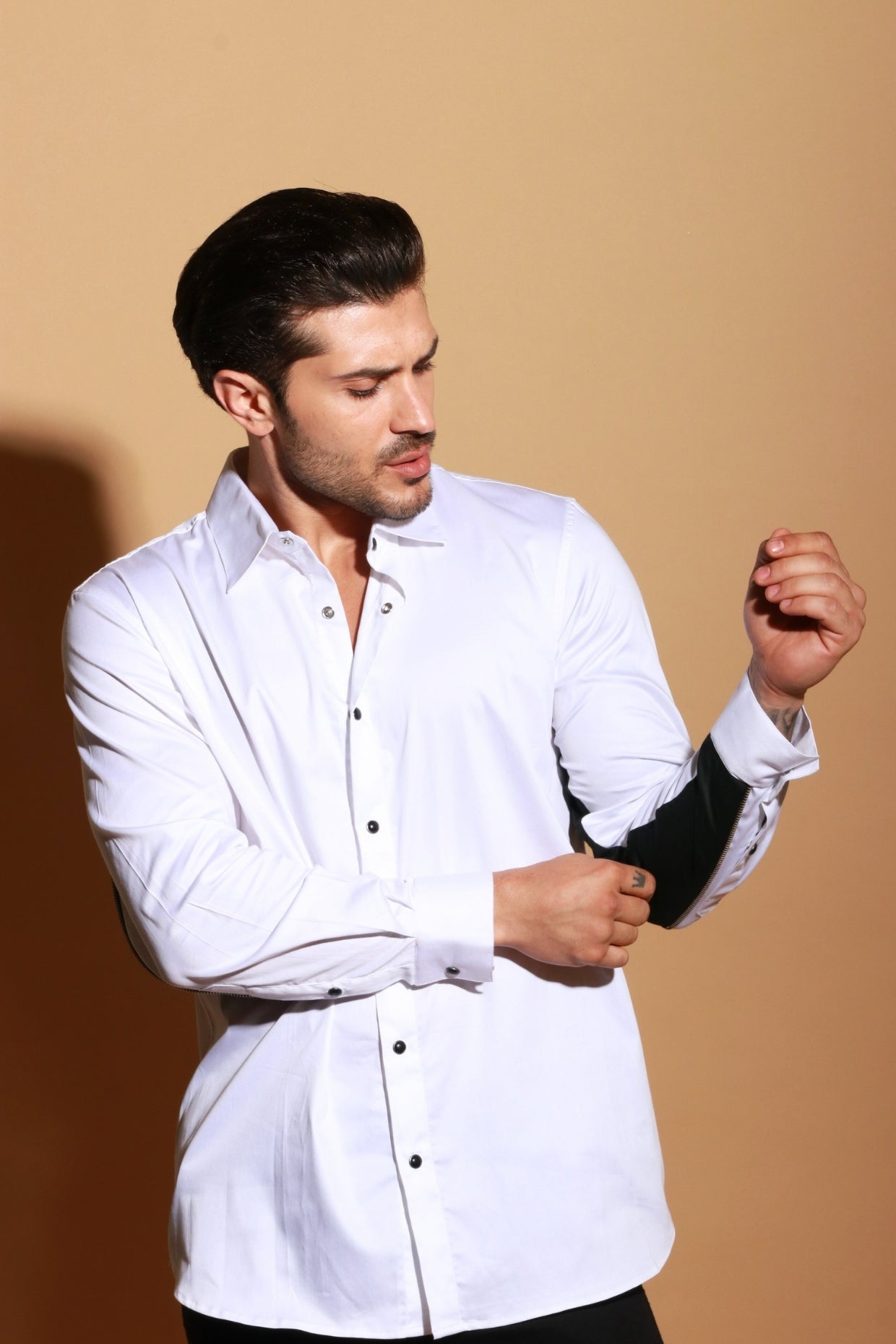Classic white shirt with under sleeve contrast detailing with zipper accent.