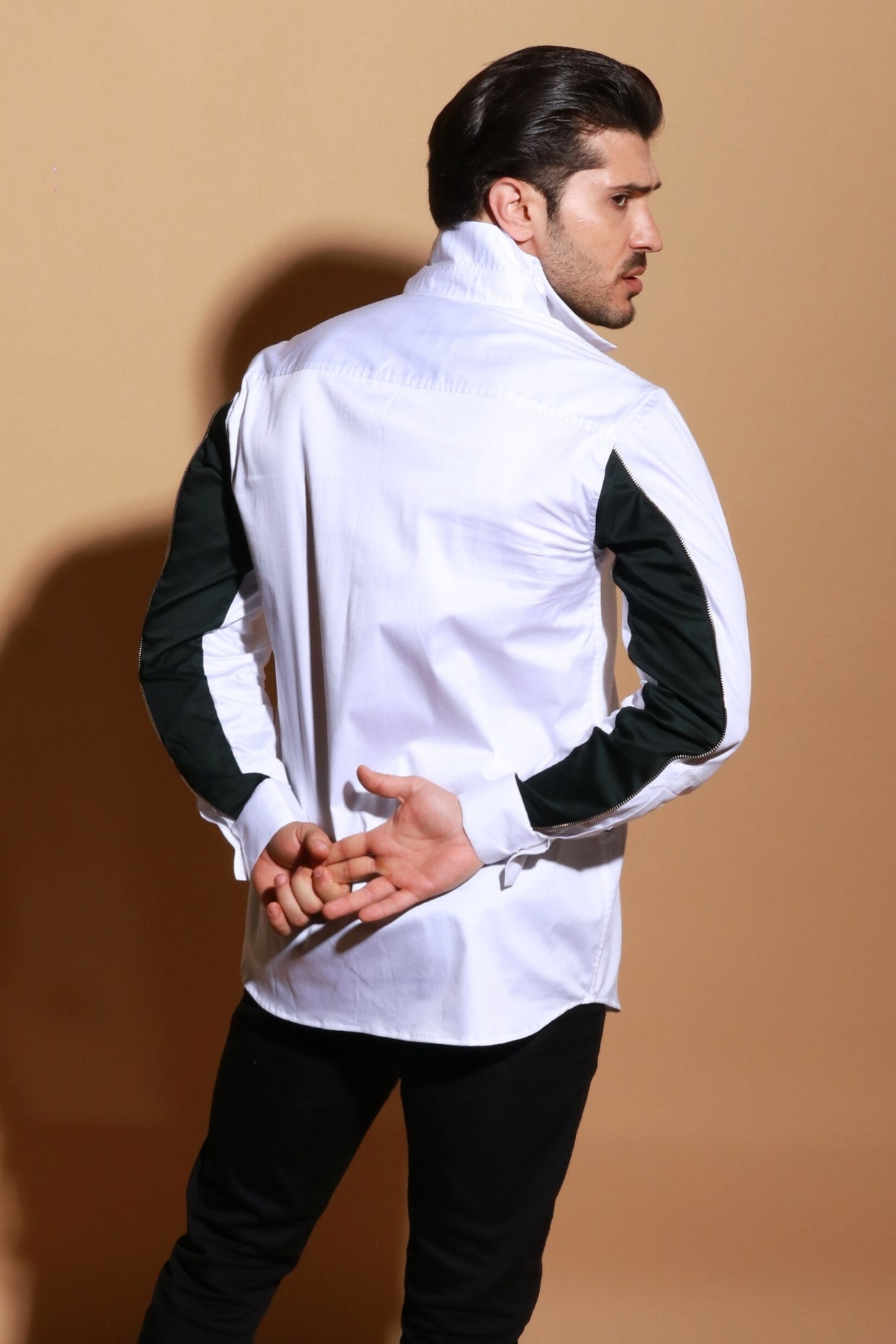 Classic white shirt with under sleeve contrast detailing with zipper accent.