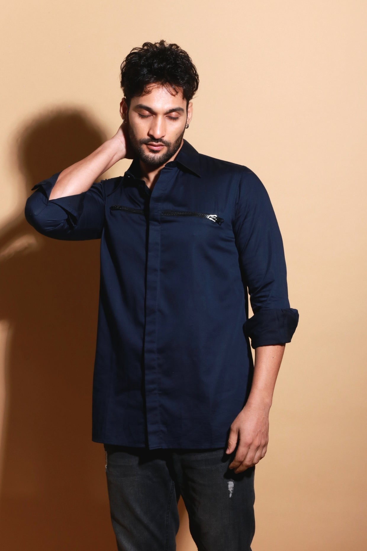 Blue classic shirt with front zipper accent.