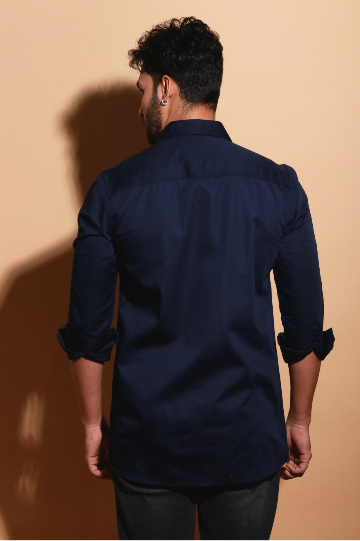 Blue classic shirt with front zipper accent.
