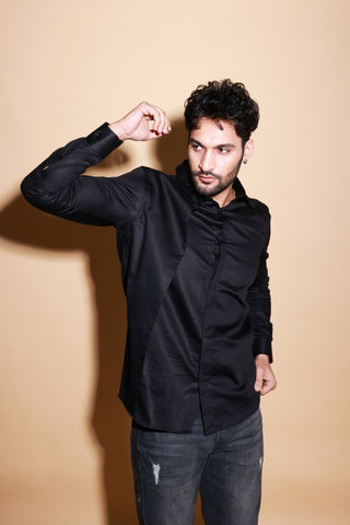 Black shirt with one side slant feature.