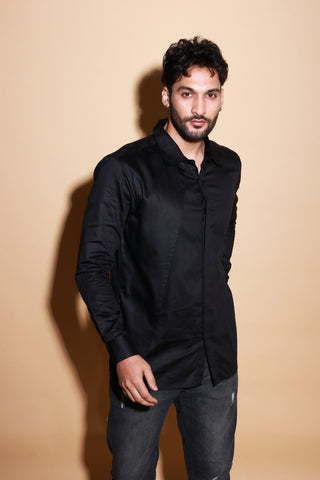 Black shirt with one side slant feature.