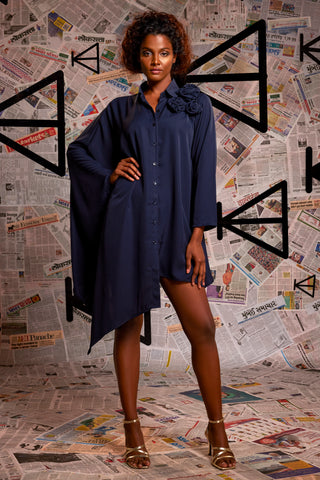 Blue rayon asymmetrical shirt with one side kaftan sleeve feature.