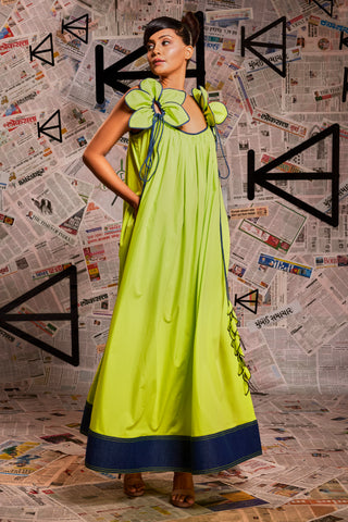 Neon green long dress self flower design with denim detailing.