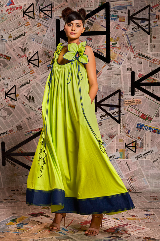 Neon green long dress self flower design with denim detailing.