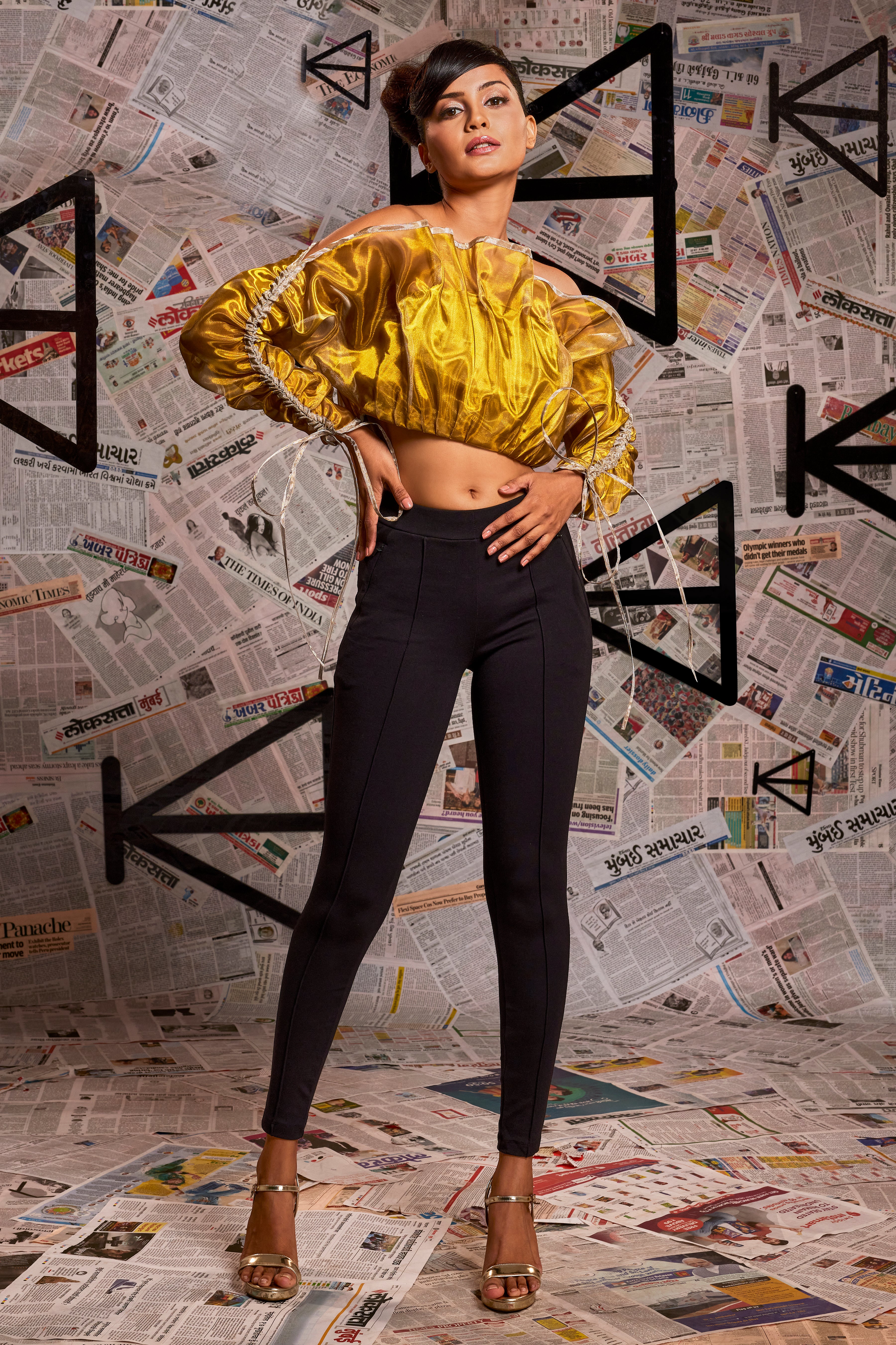 Gold and silver foil strapless top.