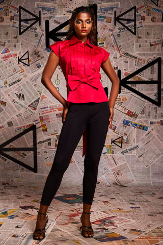 Maroon pearl lycra Sleeveless pleated shirt with detachable bow.