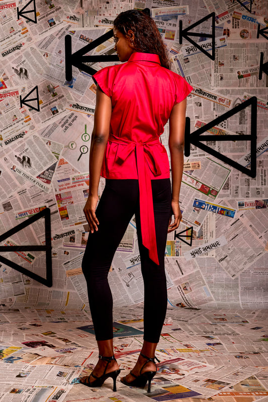 Maroon pearl lycra Sleeveless pleated shirt with detachable bow.