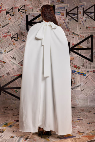 White High neck tie-up cape.