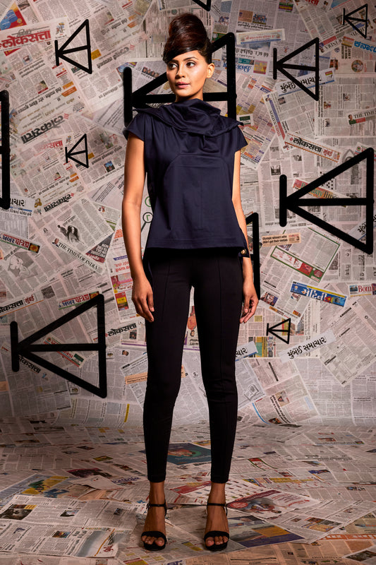 Navy blue cotton top with broad neck and extended shoulder.