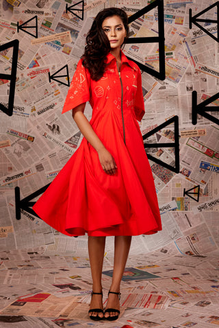 Coral dress with bat sleeves and long flared dress with asymmetric bottom.