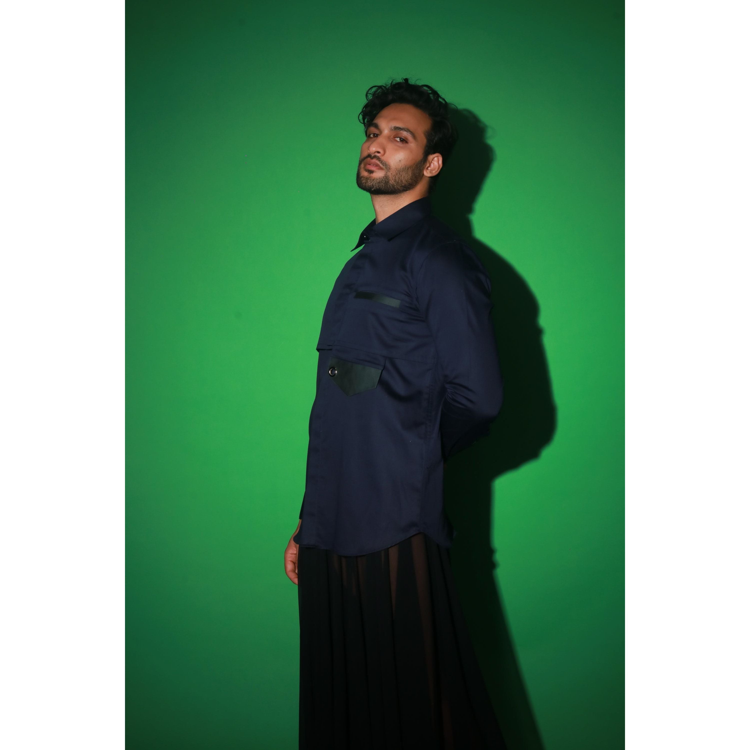 Navy blue shirt with extended pocket feature