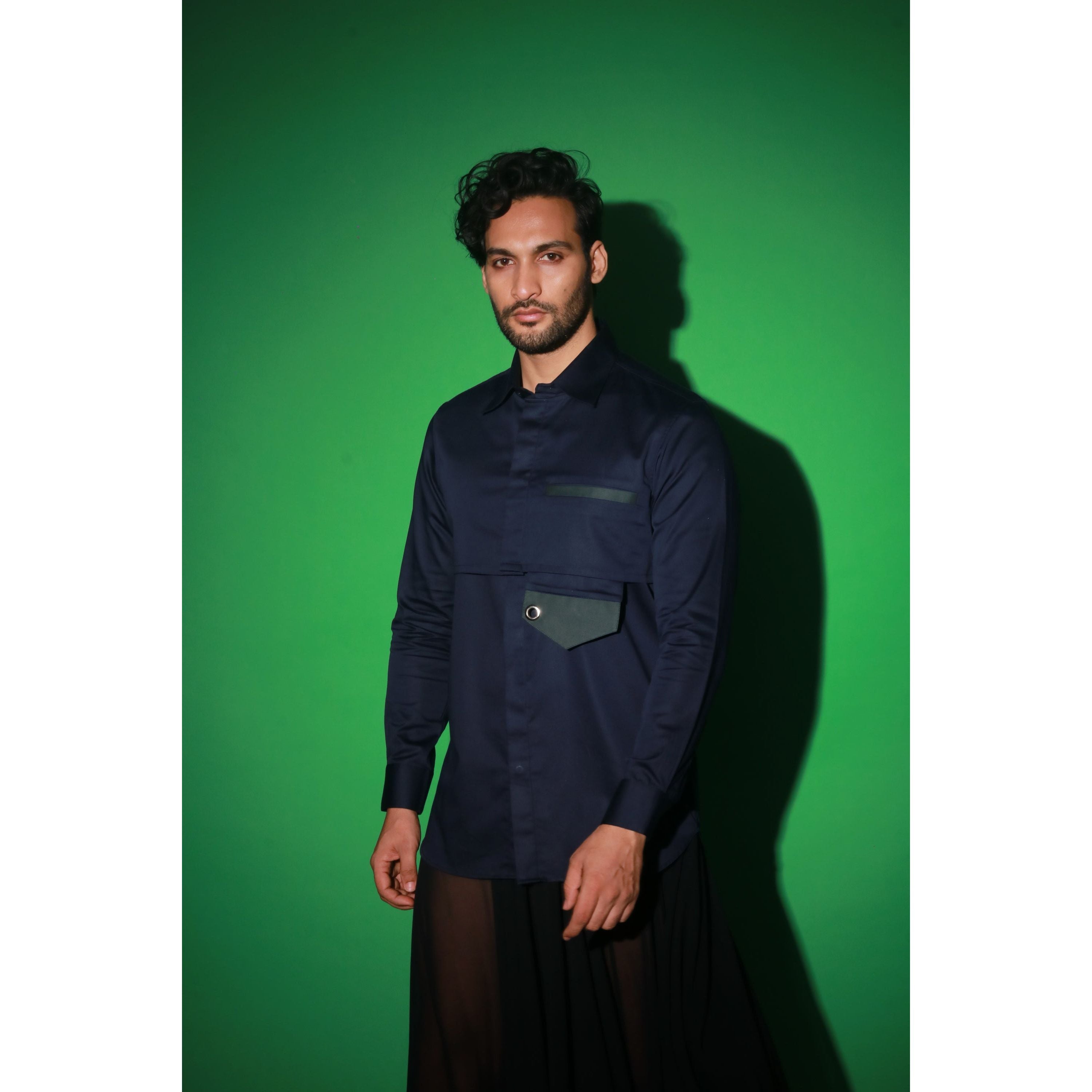 Navy blue shirt with extended pocket feature