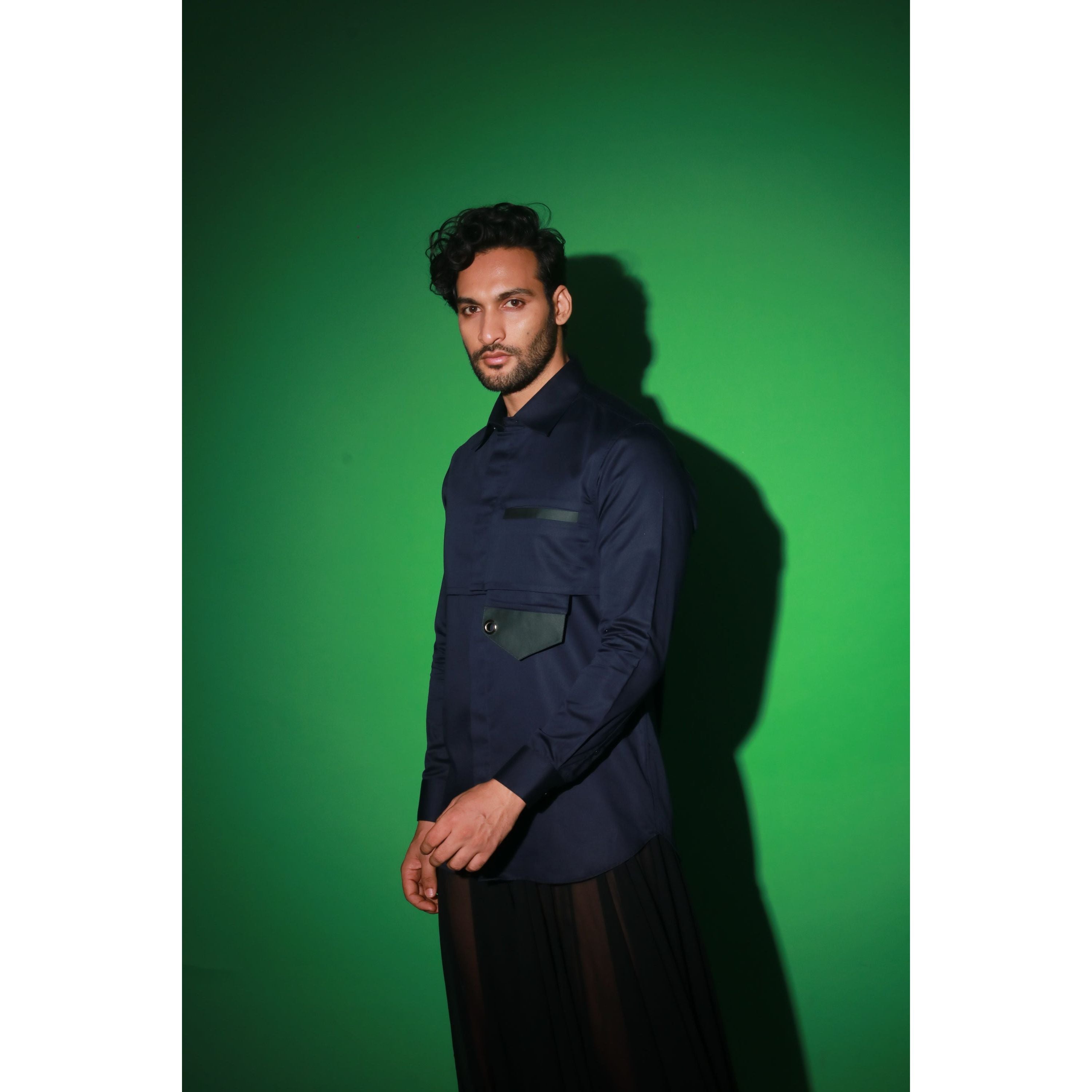 Navy blue shirt with extended pocket feature