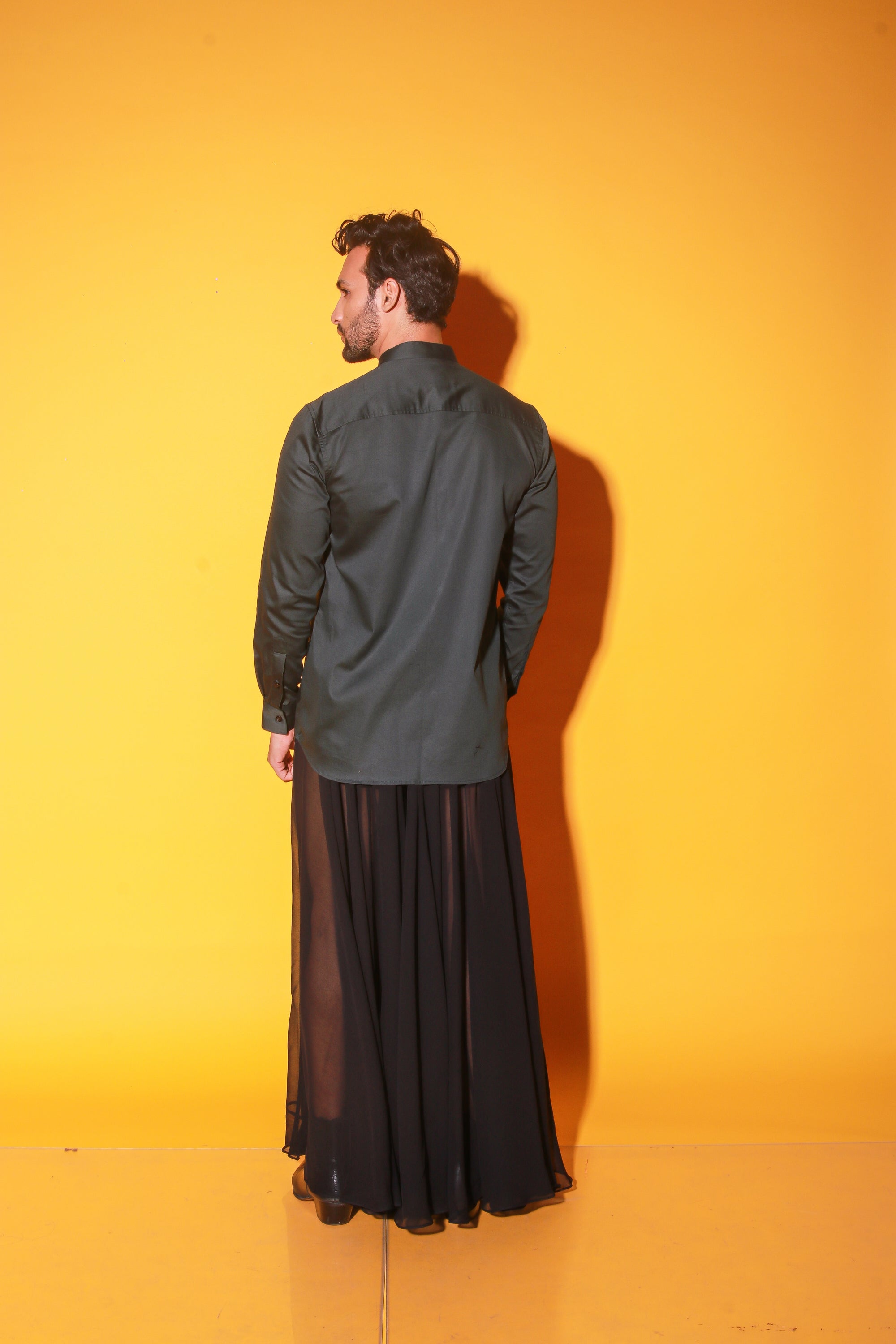 Green mandarin collar shirt with self stripped detailing.