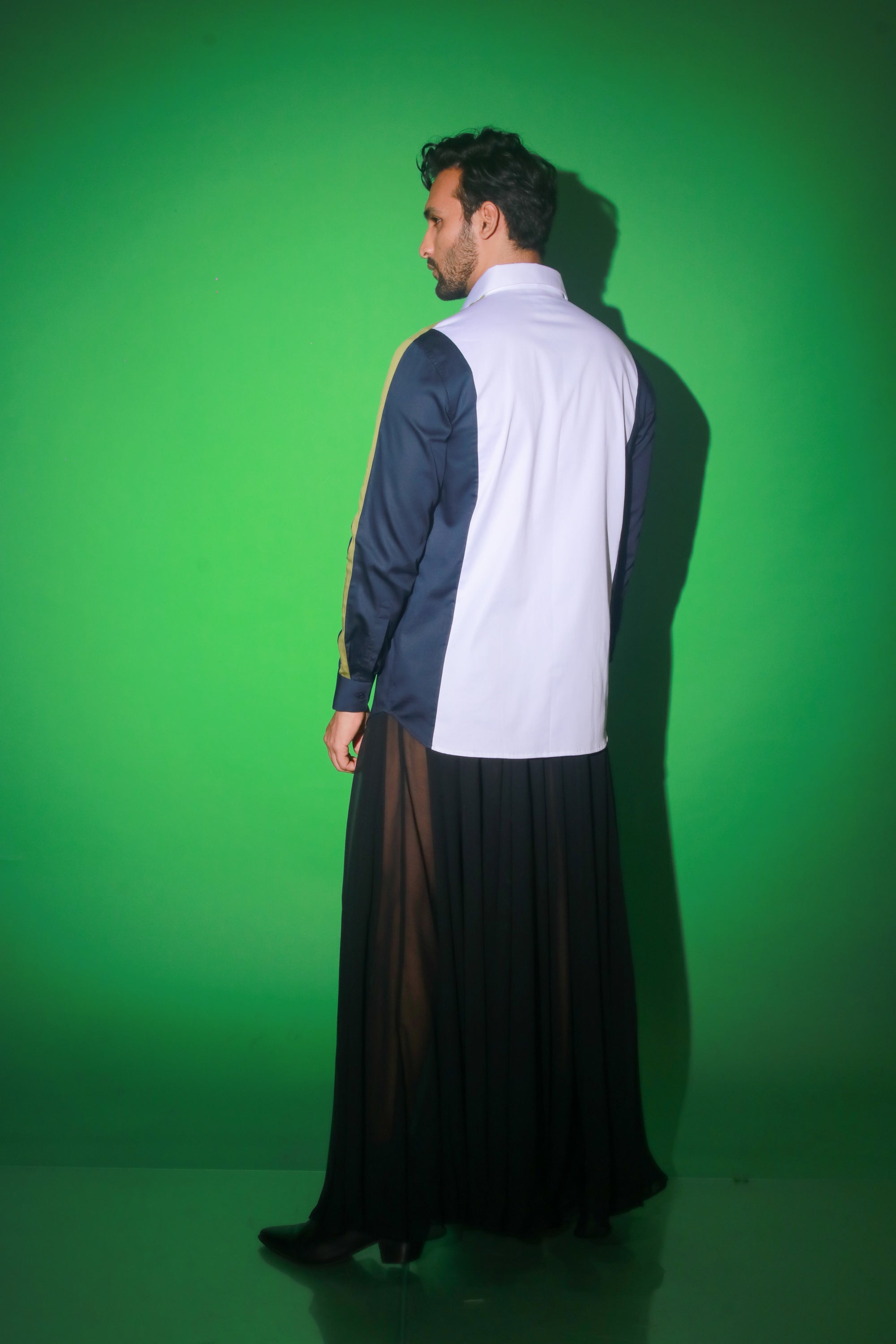 White shirt with blue and moss green strip feature.