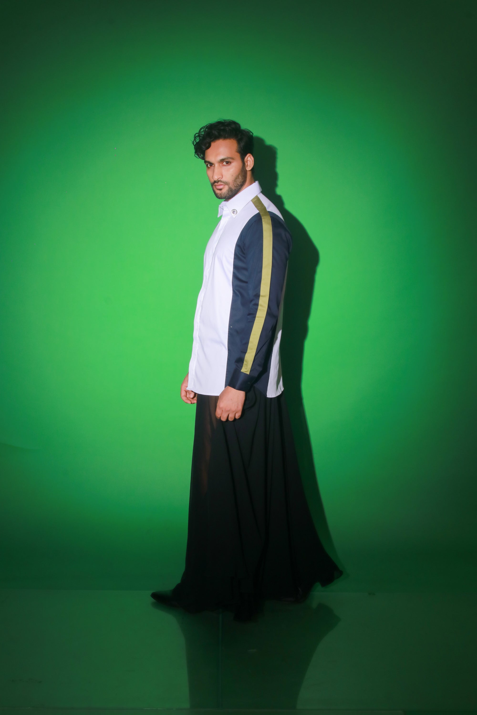 White shirt with blue and moss green strip feature.