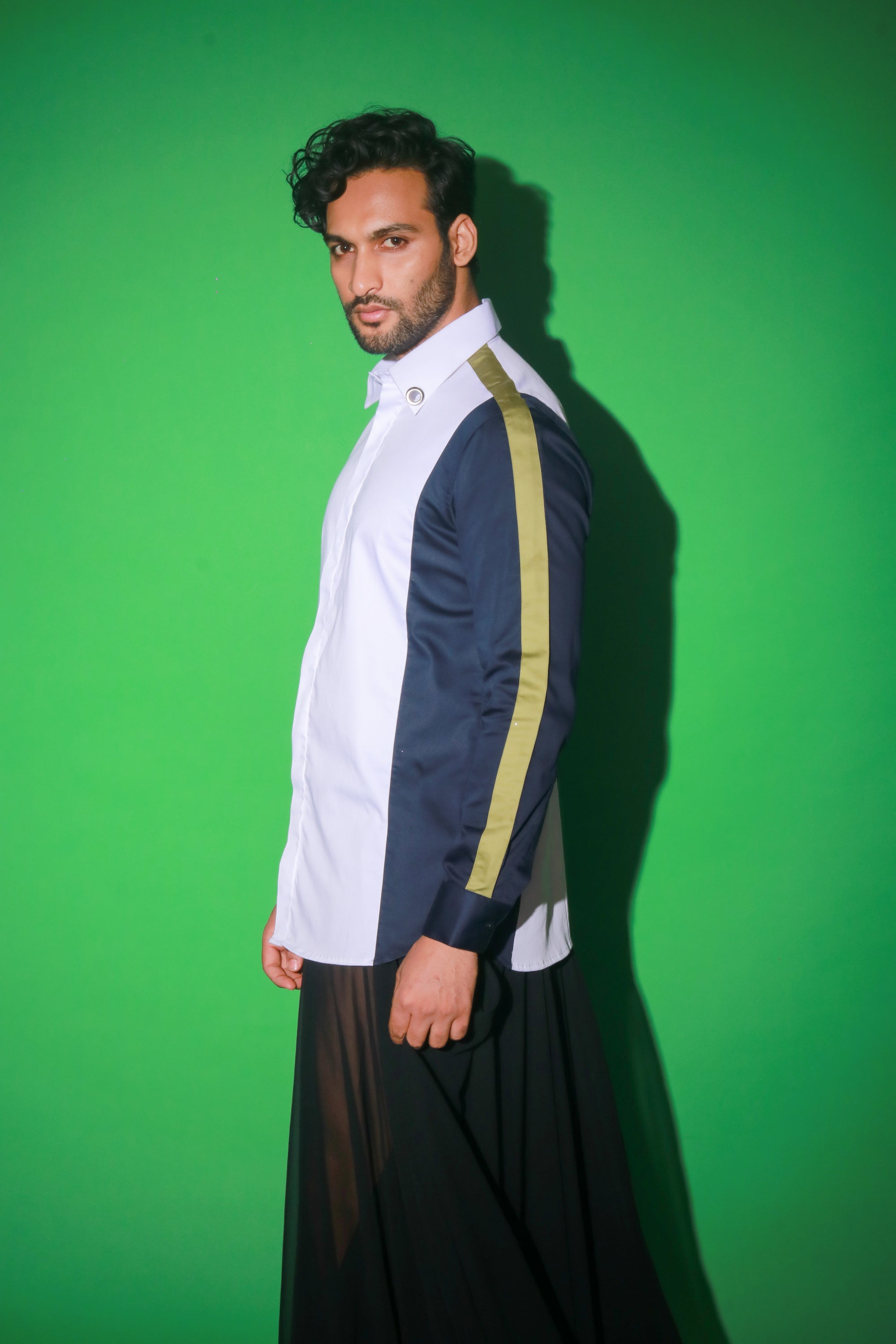 White shirt with blue and moss green strip feature.