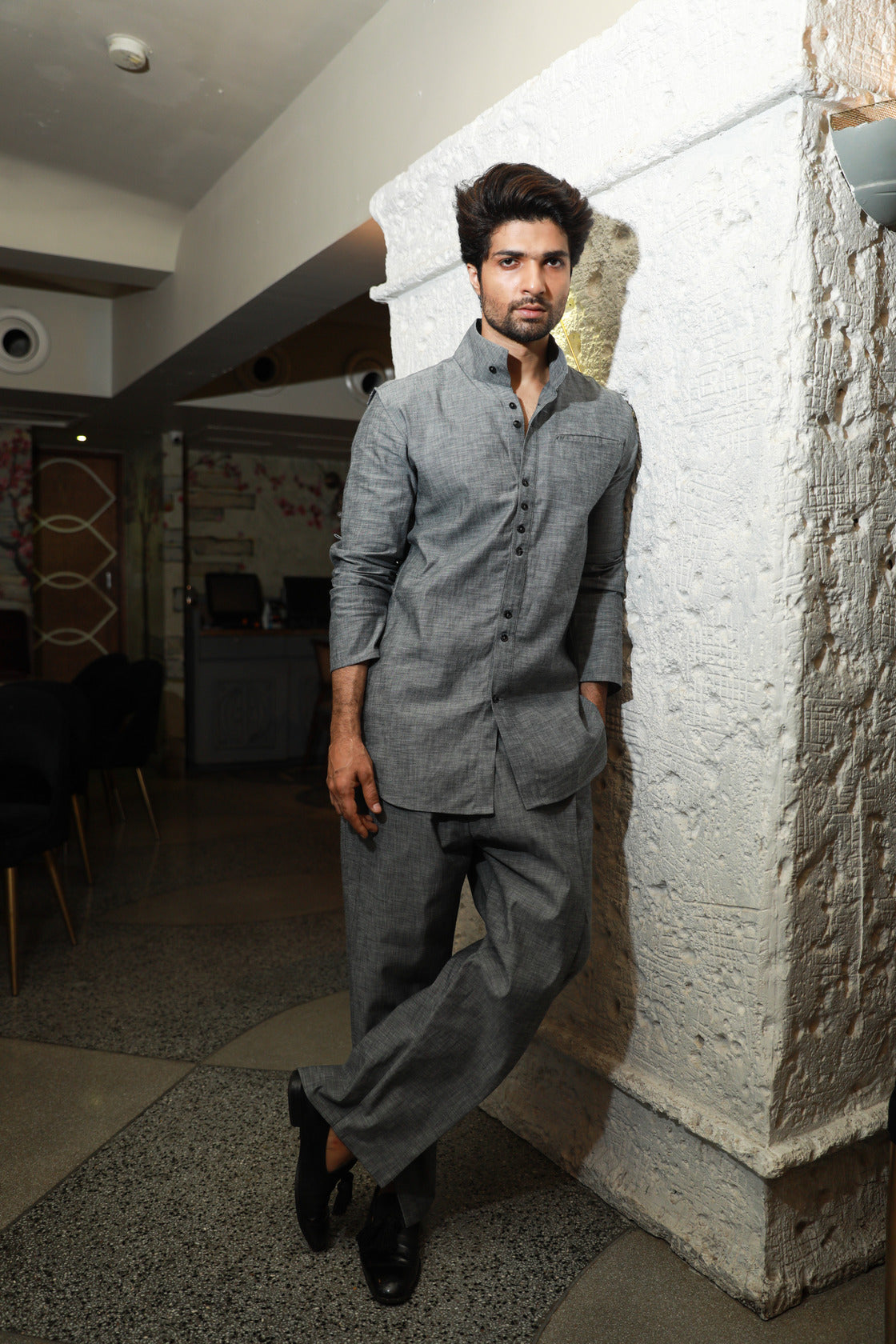 Grey band gala style shirt with narrow double overlap pants.