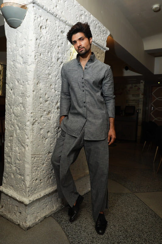 Grey band gala style shirt with narrow double overlap pants.