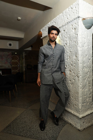 Grey band gala style shirt with narrow double overlap pants.