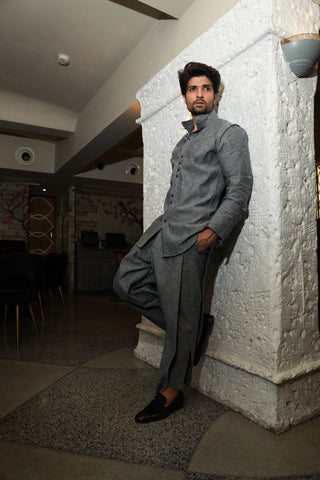 Grey band gala style shirt with narrow double overlap pants.