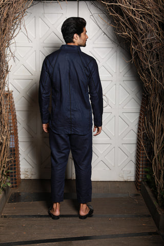 Blue linen co-ord set with black piping detailing.