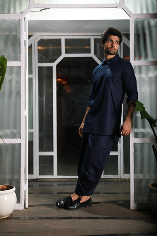 Blue linen double collared kurta with dhoti pants.