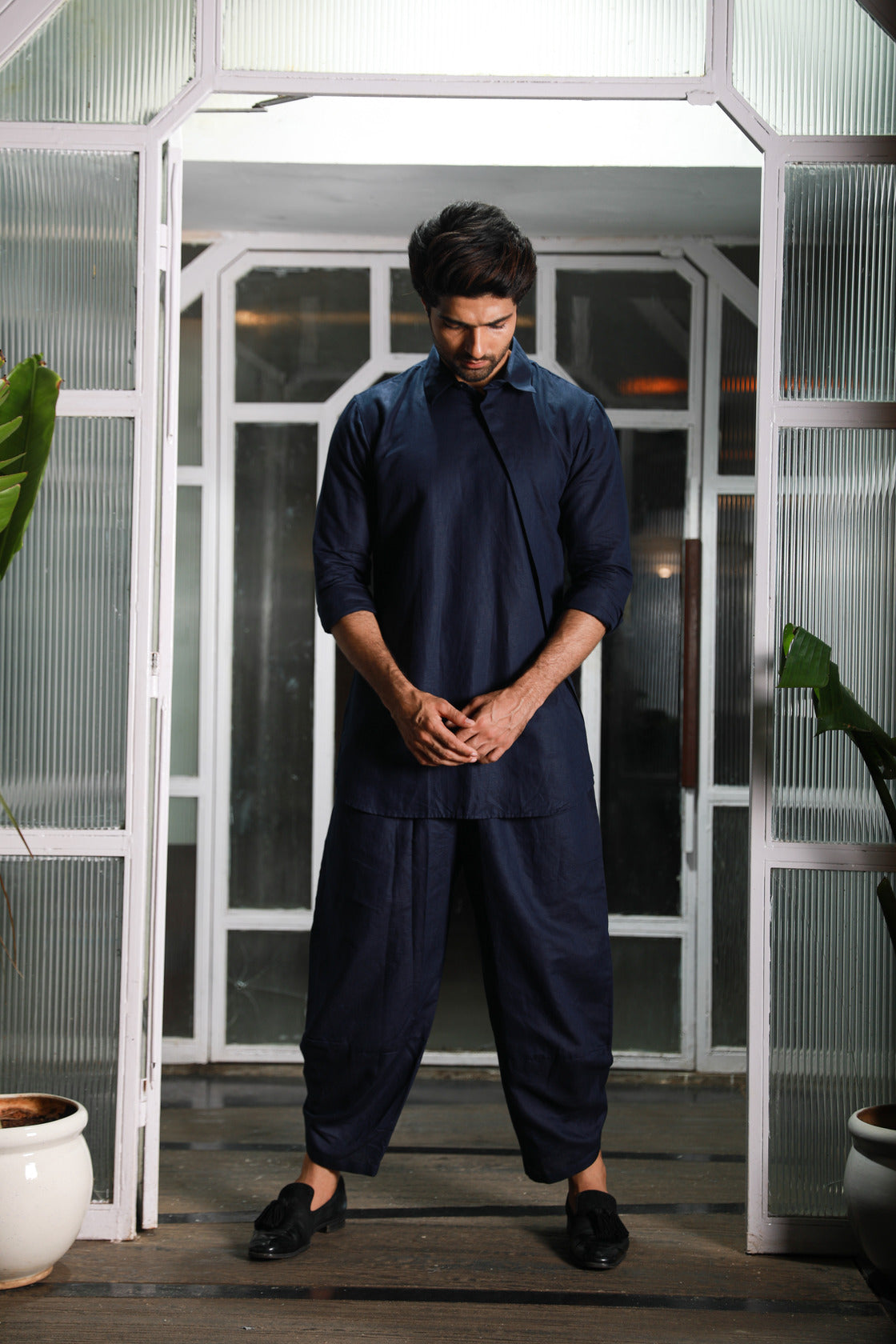 Blue linen double collared kurta with dhoti pants.