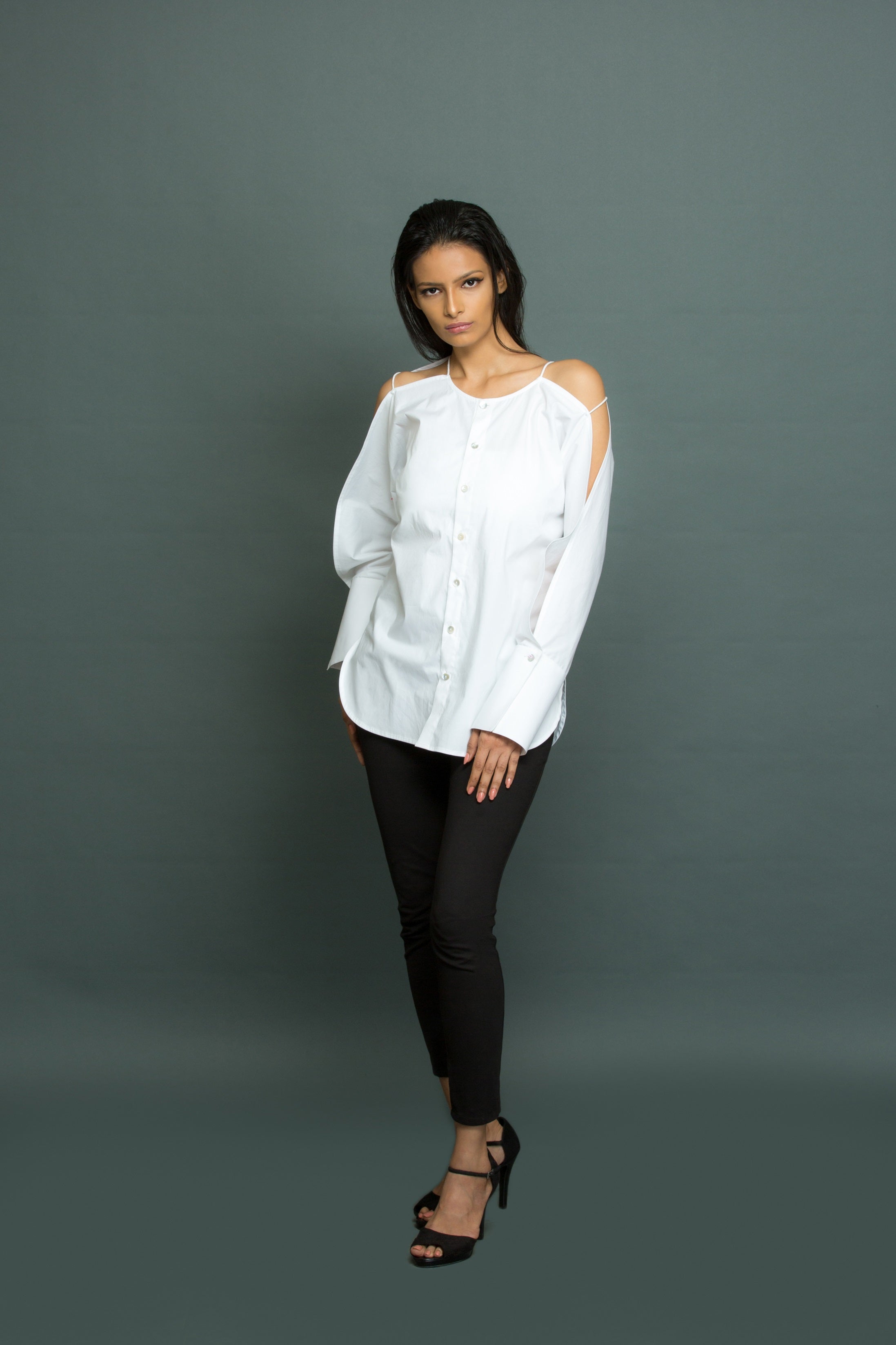 White top with open sleeve feature with self strings