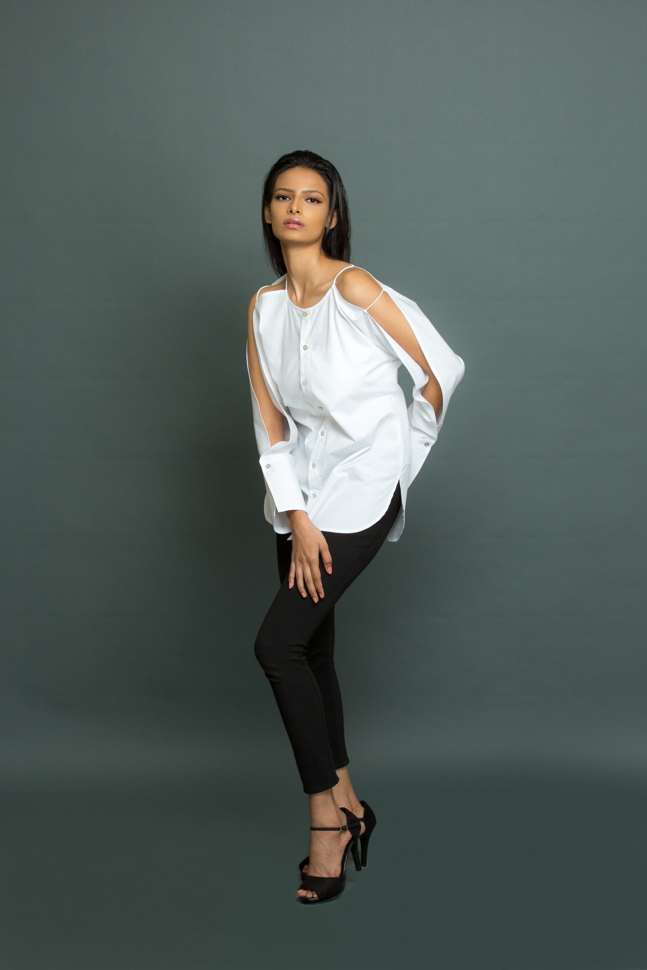 White top with open sleeve feature with self strings