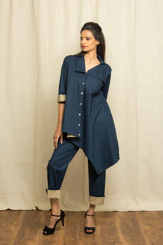 Blue co-ord set features an asymmetric top and matching pants with khaki facing detailing.